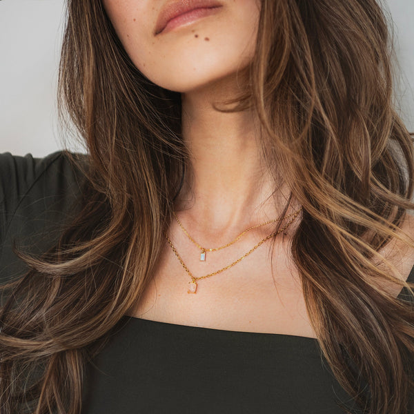 Collier or et petite opale