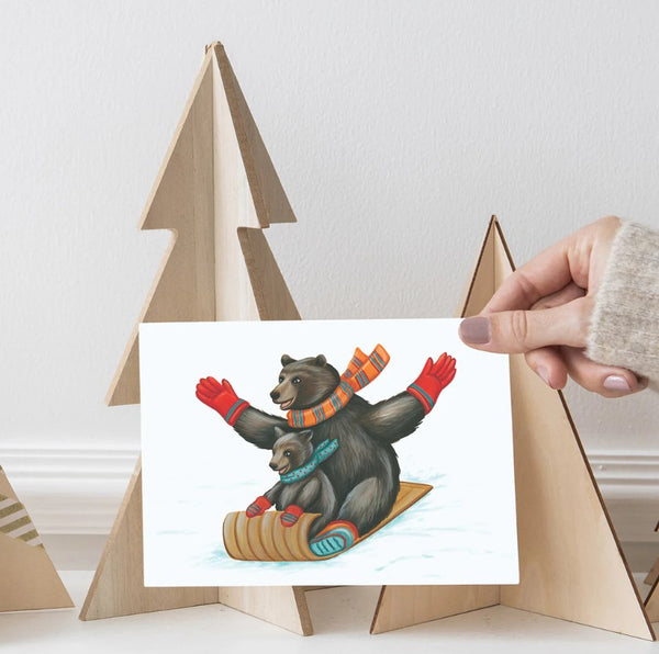 Carte de voeux L'ours noir qui glisse