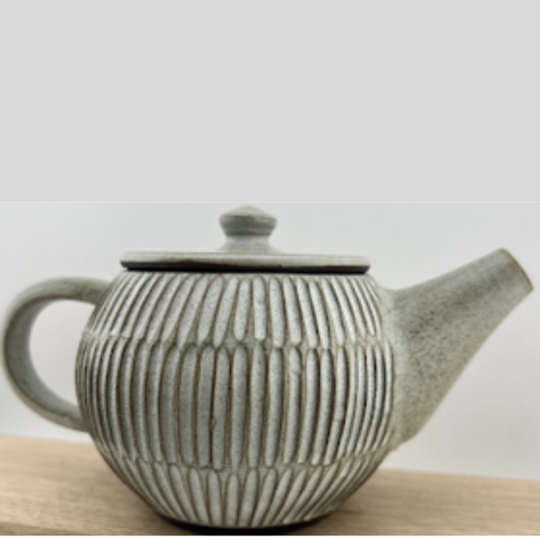 Théière en céramique blanche