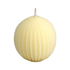 Fluted sphere beeswax candle