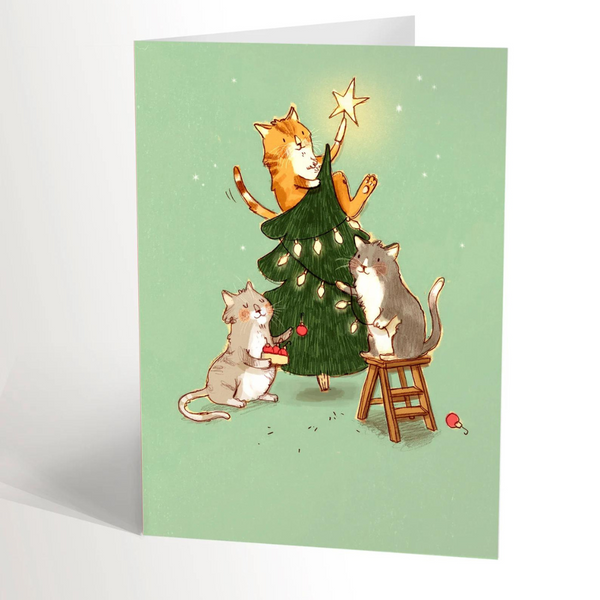 Carte de vœux les chats décorent le sapin